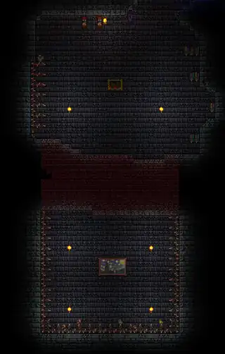 A Spike Pit with Dangersense buff active. The torches are placed by a player.