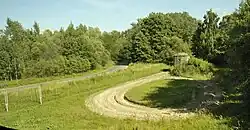 Brest: a security electric fence, a ploughed trace-control strip, and pillbox.