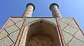 A close-up of the iwan and the two minarets flanking it