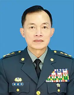 Republic of China Army (ROCA) General Chung Shu-ming, wearing a dress uniform with a metal name pin showing his full name in Chinese