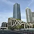 A skyward view of the Mori JP Tower and the Garden Plaza A Mall