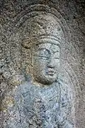 Rock-carved Bodhisattva in Half Lotus Position at Sinseonam Hermitage in Gyeongju, Korea