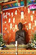 Seated Vairocana, 9th century. Iron, Jeungsimsa. Gwangju, South Korea