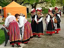 Image 9Estonian folk music performers dressed in 19th-century festive folk costumes (from Culture of Estonia)