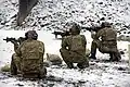 1st Battalion, 10th SFG (A) operators practice firing SOPMOD M4A1 carbine variants at the Panzer Range Complex.