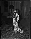 Priscilla Lawson in a satin and fur negligee