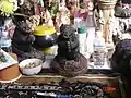 Image of a Sihuhata amulet, Wat Phra That Doi Khao Kwai Kaew, Charcoal-eating Posture