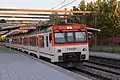 A 592 DMU with the Regionales livery in El Casar, Getafe near Madrid