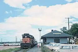 A Milwaukee Road passenger train at Rothschild in 1967