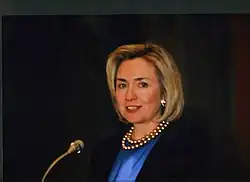 Hillary Clinton delivering her speech during her visit to AUCA on November 11, 1997