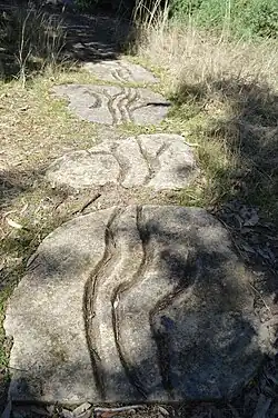 A Hill, a River, Two Rocks and a Presence (1997) by John Davis