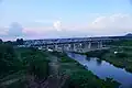A train passing on a bridge over Gosthani near Bhimasingi