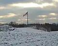 Acuity flagpole seen from Kohler's Blackwolf Run golf course