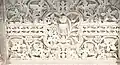 Altar carvings with grapes, vine leaves, fleur-de-lys, wheat, chalice and Eucharist