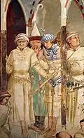 Ambrogio Lorenzetti's Martyrdom of the Franciscans (1285–1348) depicting the garb of a Mongol commander of a thousand (conical hat with the feather).[34][35]