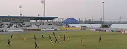 This stadium hosting a football game.
