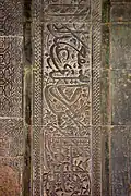 Arabic inscriptions on the stone walls inside the Mosque