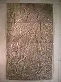 Winged genie from the Nimrud palace of Ashurnasirpal II, now at the Museu Calouste Gulbenkian in Lisbon.