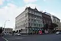 Australis House and Arthur H. Nathan Warehouse (architect Arthur Pollard Wilson, who also designed Strand Arcade, Naval and Family Hotel,Northern Steam Ship Company Building and Isaacs’ Bonded Stores)[7]