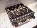 A 1950s Philips car radio using both transistor and valves. This model used a range of valves that only required 12 volts for their plate (anode) voltage.[46]