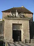 The outside face of the Porte Royalste.