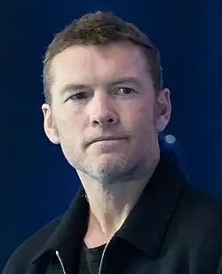 A photograph of Sam Worthington