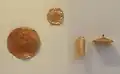 Gold discs and ornaments[212]