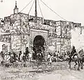 The original single-arch Bab El Khadra, shortly before it was torn down and replaced by the current version