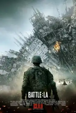 A soldier looks towards a giant extra-terrestrial dome-shaped metallic structure.