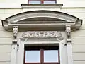 Pediment and adorned lintel