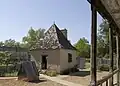 Reconstructed kitchen building at rear of house
