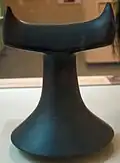 A polished basalt breadfruit pounder