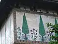 A well-preserved portion of the tomb's exterior