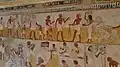 Agricultural scene depicting the harvesting of grain and scribes keeping count of it