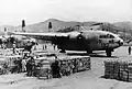 C-119 airlifting cargo from Japan to Korea.