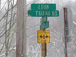 Signpost marking the hamlet of New Albion