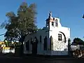 Weird bell-gable in the Merced de las Huertas church, in Mexico City. It is attached to a belltower.