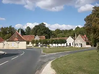 The centre of Villegongis, with the town hall, the hall, the church, the well and the inn