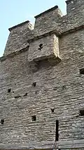 The battlements and the bretèche of the residence