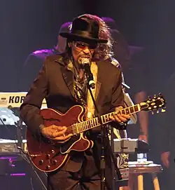 Close-up of Brown singing