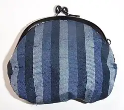 Coin purse made from tsumugi. The thicker portions of yarn visible in the weave are called slubs.