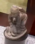 Reproduction of the "Conquering Warrior" effigy pipe from Spiro