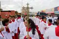 Female servers in a public procession