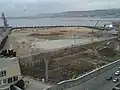 Construction site (01.03.2013): An island had been created, pile testing started on it; piling work for the onshore part was completed