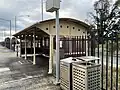 Northbound view from the station platform, showing the shelter on new platform, June 2023