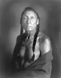 Curley Bear, Roland W. Reed