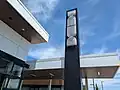 Deerfoot City logo on a building
