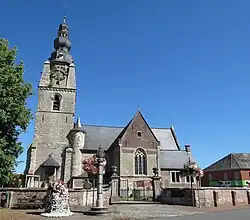 Mespelare, with its church and pillory
