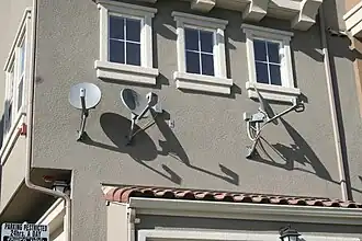 Image 18DBS satellite dishes (from History of television)