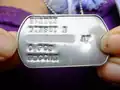 Air Force ID tag (serial number blurred), modern, designation: Wiccan